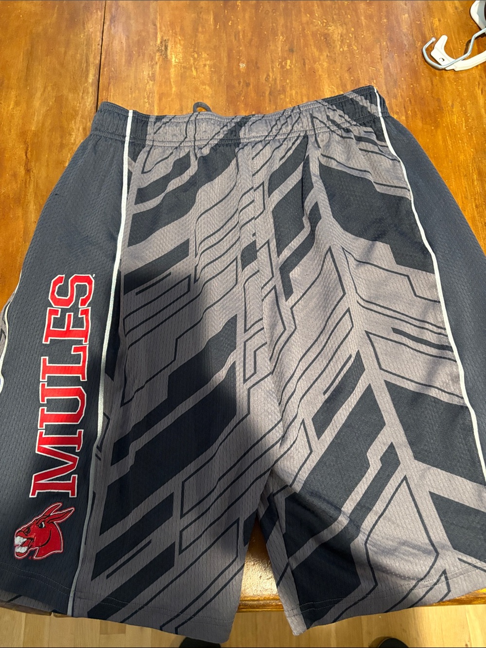 Under Armour Men's Black and Gray Athletic Shorts with Red Accent